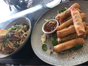 Spring rolls and spicy mushroom pasta at VegOut on Charles in Launceston