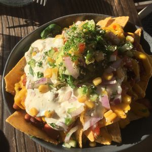 Nacho's with spicy beans and guacamole. Yum! at VegOut on Charles in Launceston