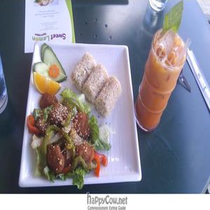 sesame soy chunks, salad, brown rice, thai iced tea! at Sweet Lemon Vegan Bistro in Portland