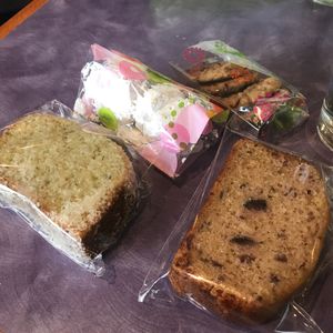 The currant pound cake (on the right) was so moist, soft and amazing. The powdered sugar cookies (Mexican Wedding cookies) were also amazing. The chocolate chip was ok, but the coconut/pandan pound cake (on the left) was too dry. at Sweet Lemon Vegan Bistro in Portland