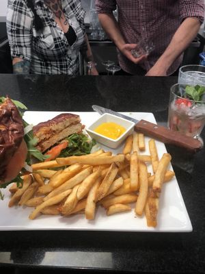 Buffalo burger with Pink Lush drink  at The Modern Vegan in Las Vegas
