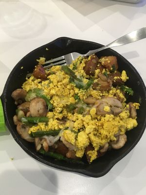 Breakfast skillet with onions, mushrooms, asparagus, potatoes, mozzarella, and tofu scramble!  at The Modern Vegan in Las Vegas