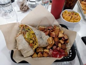 Breakfast burrito with Mac&Cheese on the side. Sooo goood! 👌 at The Modern Vegan in Las Vegas