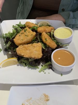 “Fish” on bed of greens (you can get chips too)! at The Modern Vegan in Las Vegas