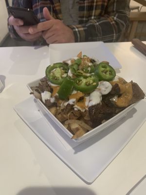 Hangover fries - sautéed onions and “steak” strips at The Modern Vegan in Las Vegas