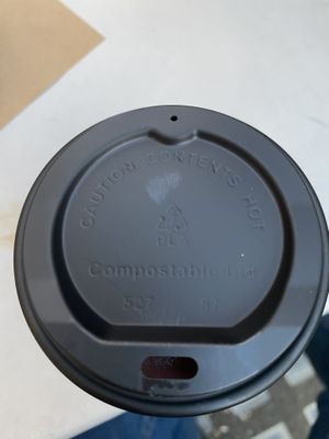 Compostable coffee cup lid!  at Crosstown Doughnuts Vegan in London