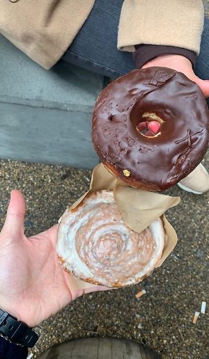 Vegan cinnamon bun and chocolate glazed doughnut   at Crosstown Doughnuts Vegan in London
