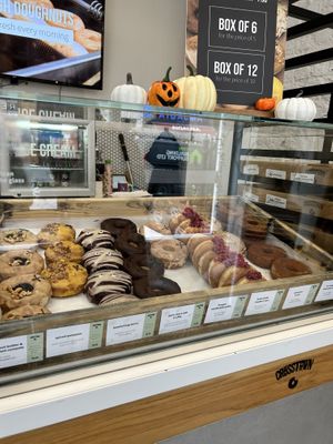 Selection of doughnuts    at Crosstown Doughnuts Vegan in London