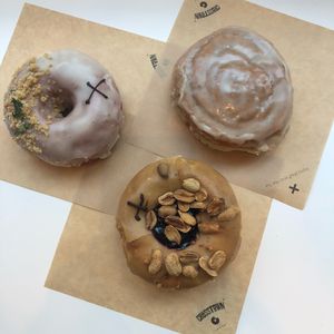 Three different vegan donuts at Crosstown Doughnuts Vegan in London