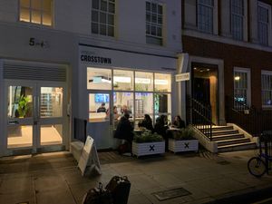 Outdoor seating in use! at Crosstown Doughnuts Vegan in London