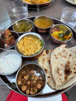 Veg Thali w naan, chickpea and lentils, raita. pakora, spinach paneer, dal, rice and veg curry at Namaste in Bayonne