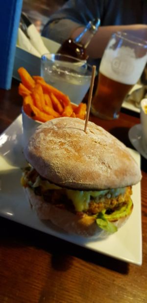 Lentil chickpea burger with vegan cheese at The Courthouse Bar in Douglas