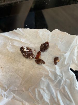 Supposedly chocolate pieces. Made our bowl unpleasant because they were more like fruit pits and not something you would eat.  at Eat Good Market Deli - Pineapple Express Bistro in Vernon