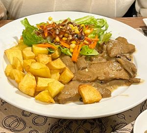 Seitan escalope in creamy sauce (so good)  at Canadu in Malaga
