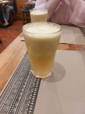 Fresh apple, pinneapple, orange juice at Canadu in Malaga