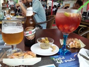 San Miguel vegan beer, sangria without alcohol, and very tasty olives. at Canadu in Malaga
