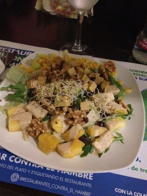 Canadu salad with pineapple and amazing dressing. Honestly my favorite thing. I know I should branch out but I keep coming back for this ;) at Canadu in Malaga