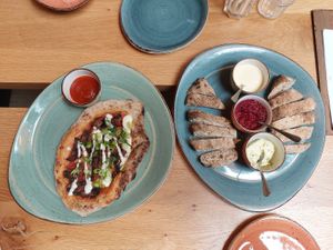 Pizza, bread with dips at Bhalu in Nijmegen