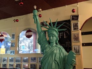 Lady Liberty watching over us as we eat. I felt reassured! at Charlie Brown's Diner in Eastbourne