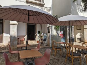 Outdoor seating at Bio.Tequim Vegetariano Restaurante in Tavira