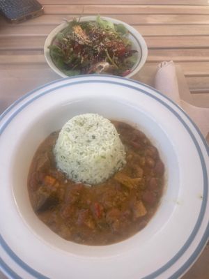 Vegan stew with rice and salad at Bio.Tequim Vegetariano Restaurante in Tavira