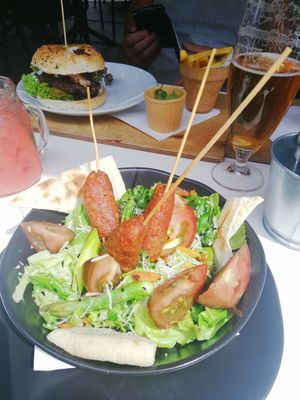 Ceaser salad with natruli koftas at Orzo People Music Nature in Krakow