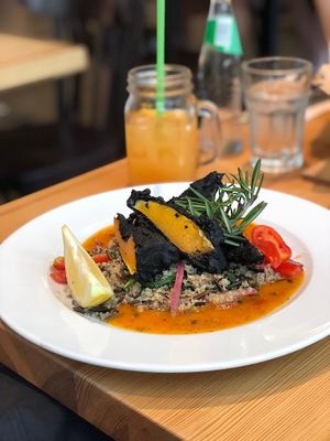 Vegan dish - Pumpkin wrapped in nori, with quinoa and wild rice at Orzo People Music Nature in Krakow