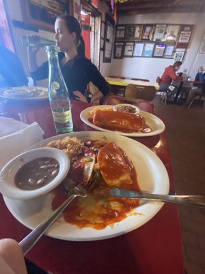 Half eaten veggie enchilada and veggie burrito   at Habanero's Fresh Mex in Las Cruces