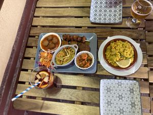 Mixed vegan plate, paella and drinks  at El Vegetariano de la Alcazabilla in Malaga