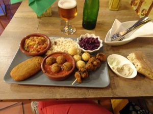 Vegan platter- traditional spanish foods veganised: albondigas and the kebab are particularly yum! Comes with 3 salads which vary daily. at El Vegetariano de la Alcazabilla in Malaga