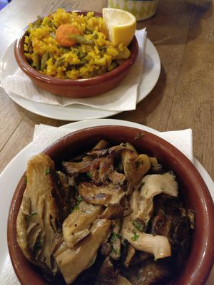 Sauteed mushrooms with smoked sea salt, vegan paella. at El Vegetariano de la Alcazabilla in Malaga