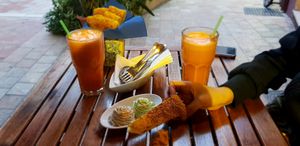 Zumo de manzana zanahoria y jengibre at El Vegetariano de la Alcazabilla in Malaga