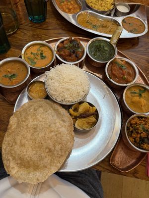 Talli selection of curries  at Herb Restaurant in Leicester