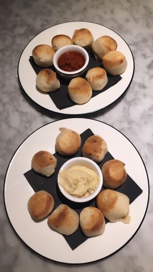 Dough balls (hummus and harissa dips) at Pizza Express in Tamworth