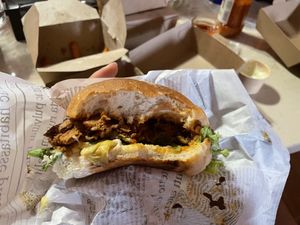 A few tasty bites into the Grillzilla burger with only a few sweet potato fries left  at Edgy Veggy in Sofia