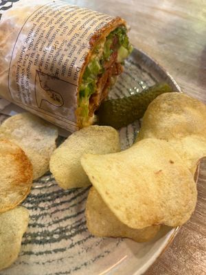 Donerrito — with vegan pulled „pork“, chips and a pickle on the side. at Edgy Veggy in Sofia