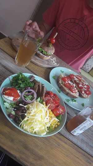 Taco salad, hummus bread and quinoa burger at Edgy Veggy in Sofia