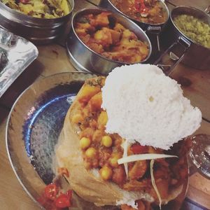 Various dishes. At the front is the “Holy Chow”. at Mowgli - Grand Central in Birmingham