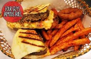 Egyptian Lamb Burger,
Minced lamb meat with our special herbs, cooked slowly packed with mix of tomatoes, onions, lettuces soaked in our homemade Dynamite Sauce or any sauce of your choice.
Also you can add extra Cheese (Cheddar+Mozzarella+Provalon)
Plus Fries and Onions rings

All meat we use is Halal at Four Guys Famous Fries in Koh Samui