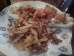 Buffalo tofu po'boy with homemade fries at The Brandling Villa in Newcastle Upon Tyne