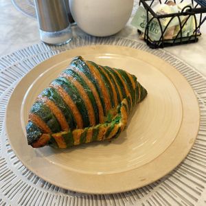 Apricot-Pistachio Croissant  at L'Artisane Creative Bakery in Coral Gables