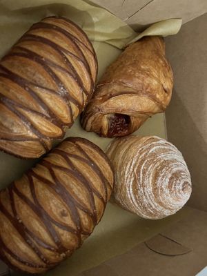 Pain au Chocolat , Guava & Cream Cheese Danish, Dulce de Leche Cruffin  at L'Artisane Creative Bakery in Coral Gables