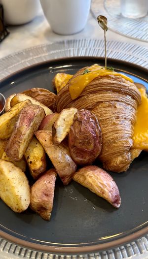 Croque Monsieur Croisaant (“ham and cheese” 😋)  at L'Artisane Creative Bakery in Coral Gables