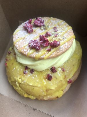 Pistachio raspberry donut  at L'Artisane Creative Bakery in Coral Gables