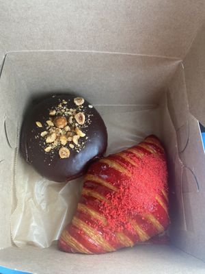 Rocher donut - 5/5, strawberry cheesecake croissant 3/5 (too much jelly not enough cheese)   at L'Artisane Creative Bakery in Coral Gables