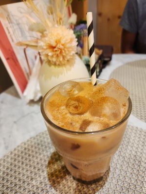Iced Chai Latte with Oat Milk at L'Artisane Creative Bakery in Coral Gables