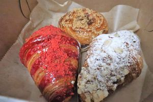 Almond Croissant, Strawberry-basil Cheescake croissant and Apple Danish at L'Artisane Creative Bakery in Coral Gables
