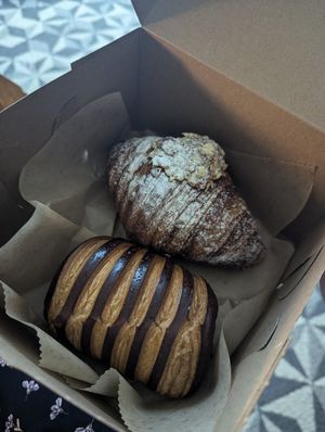 Pain au chocolat and almond croissant at L'Artisane Creative Bakery in Coral Gables