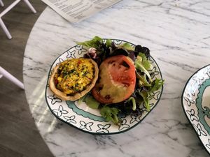 Quiche with salad at L'Artisane Creative Bakery in Coral Gables