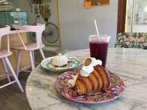 Chocolate croissant, fruit dessert, and hibiscus tea at L'Artisane Creative Bakery in Coral Gables